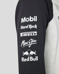 Black sleeve of a Raglan shirt featuring white sponsor logos Mobil Hard Rock Pirelli Maui Jim and Red Bull