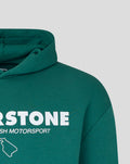 Front view of green hoodie showing bold SILVERSTONE branding across the chest