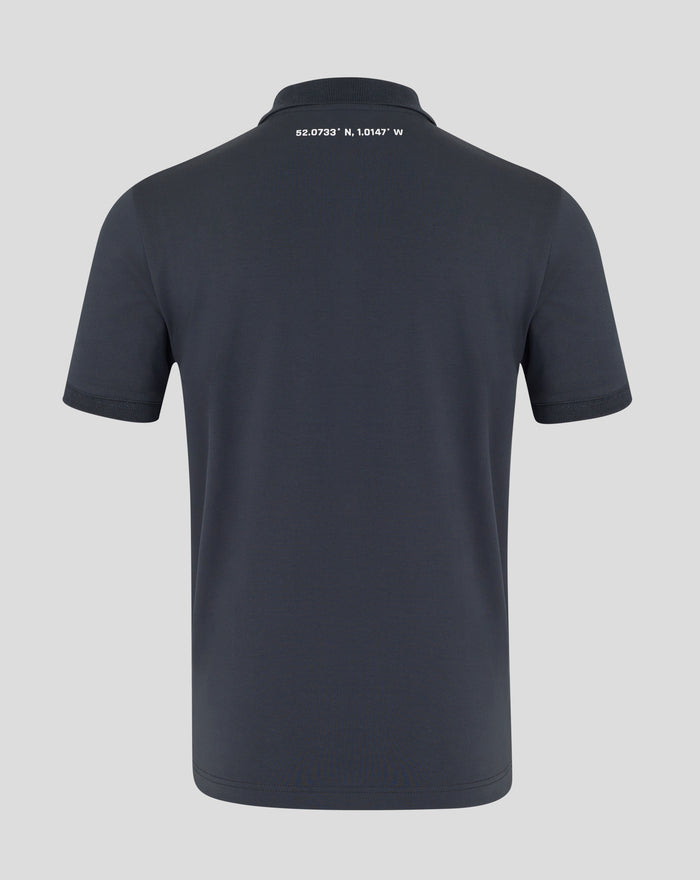 Back view of navy polo with coordinates printed across the upper back