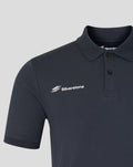Dark navy polo with rib collar; Union Jack circuit graphic on left chest and Silverstone logo on right chest