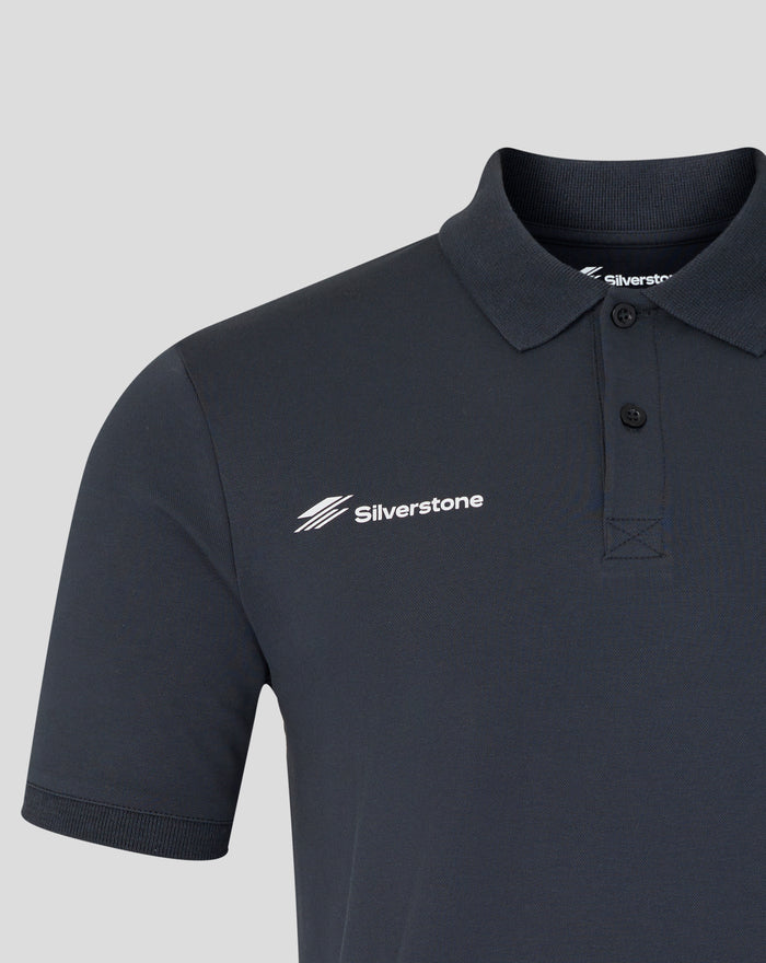 Dark navy polo with rib collar; Union Jack circuit graphic on left chest and Silverstone logo on right chest