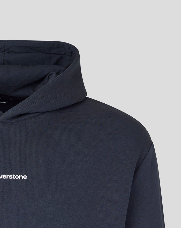 Close-up of left chest area showing the Silverstone branding on the navy hoodie