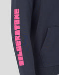 Close up of navy hoodie sleeve showing bold pink vertical lettering and partial kangaroo pocket