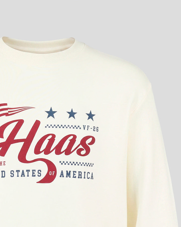 Close-up of chest print on egret Haas Team USA flag sweater featuring Haas script and star accents