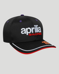 Black Aprilia Racing cap with white aprilia embroidery and red RACING text on the front, curved visor with white piping and red underbill, purple button and eyelets
