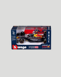 1:43 scale Red Bull Racing Formula 1 car with Oracle branding Verstappen livery on a neutral gray background