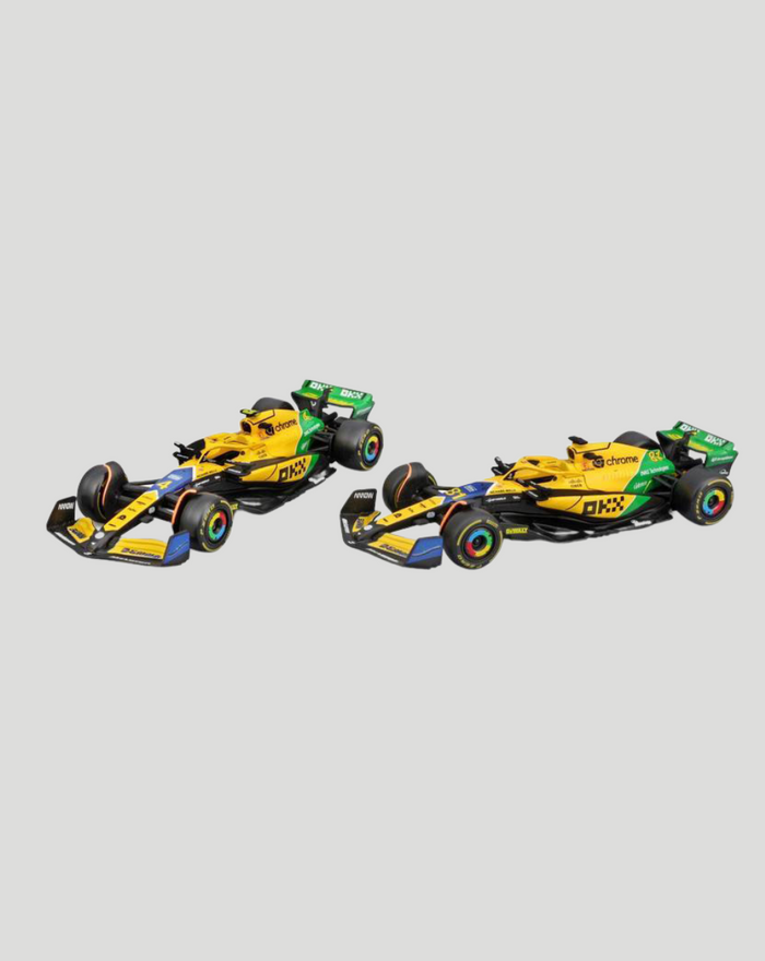 Two 1:43 scale McLaren MCL38 2024 Norris Ayrton Senna livery model cars