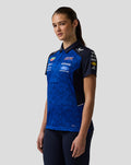 Female model wearing blue Oracle Red Bull Racing Teamline polo with sponsor logos and AerTek branding