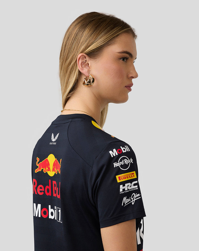 Side profile of a model wearing a Night Sky Oracle Red Bull Racing Women’s Teamline Set Up T Shirt with sponsor logos