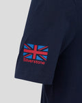 Close-up of the navy sleeve showing a red Union Jack patch and Silverstone branding