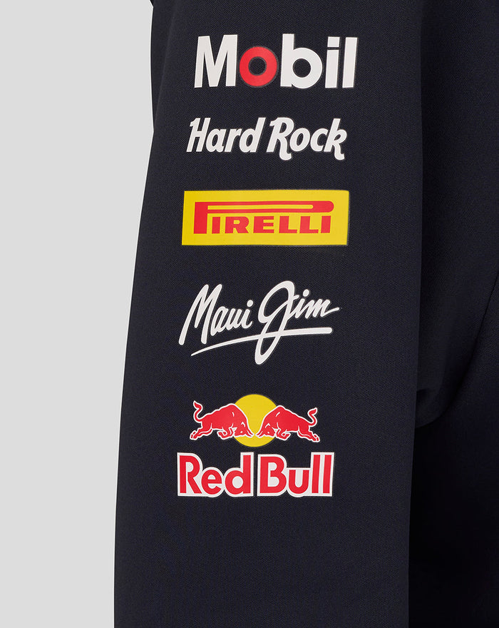 Close up of the hoodie sleeve showing stacked sponsor logos Mobil 1 Hard Rock Pirelli Maui Jim and Red Bull