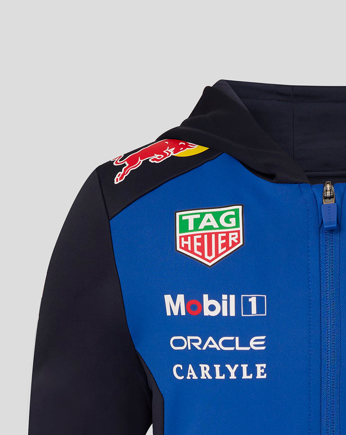 Shoulder close-up of blue and black hoodie with sponsor logos TAG HEUER Mobil 1 Oracle Carlyle and Ford Racing