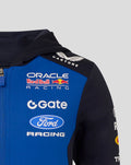 Shoulder and hood close-up showing Castore logo on black hood and Oracle Red Bull Racing branding on a blue panel