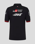 Back view of black Official Haas Team Junior Short Sleeve Polo Shirt with large Haas and Toyota Gazoo Racing logos and a small flag at the collar.