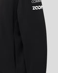 Close-up of black Haas Team Junior Pullover Hoodie showing contrast shoulder panel and white branding on the sleeve