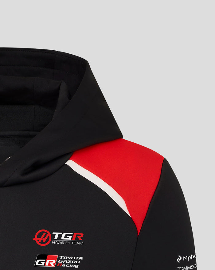 Official Haas Team Junior Pullover Hoodie in black with red shoulder panels and Haas branding on the chest