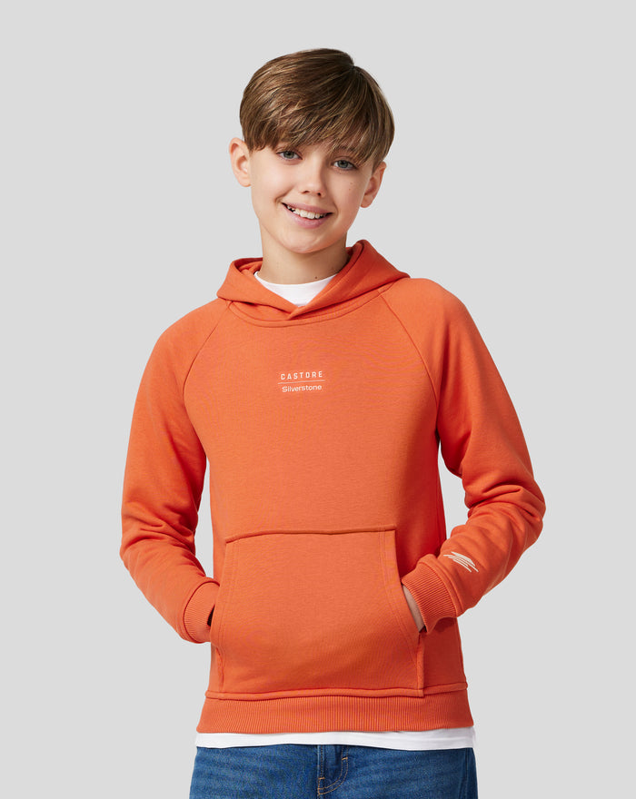 Junior orange hoodie with white Castore Silverstone chest logo and back neck Silverstone emblem