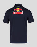 Back view of navy Red Bull Racing polo with a large Red Bull logo on the upper back and Castore branding