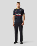 Model wearing navy Oracle Red Bull Racing Set Up T‑Shirt with a large Red Bull logo across the chest and team branding