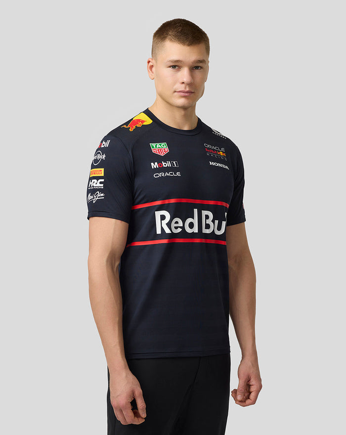 Front view of a model wearing the Oracle Red Bull Racing Set Up T Shirt in night sky navy with a large Red Bull logo across the chest.