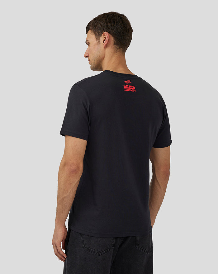 Back view of a man wearing a black Unisex Silverstone Legend T-Shirt with a small red logo on the upper back.