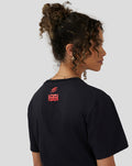 Back view of a model wearing a black Silverstone Legend T-Shirt with a small pink Union Jack graphic on the upper back.