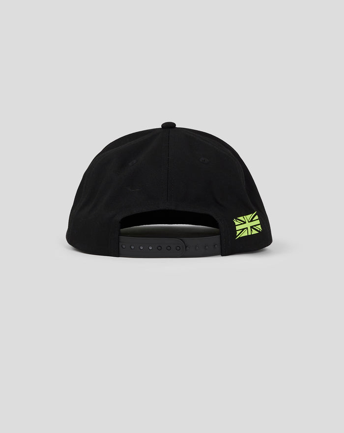 Back view of black Unisex Silverstone Bring The Energy Cap with a neon green patch on the side and an adjustable snapback