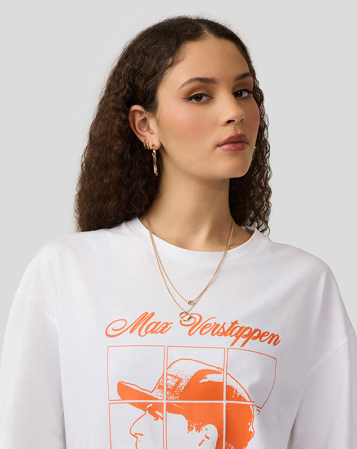Close up of a white Max Verstappen puzzle T shirt with an orange graphic on the chest worn by a model