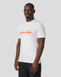 Side view of man wearing white Oracle Red Bull Racing T shirt with large front logo