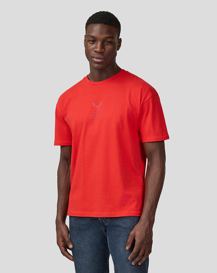 Male model in Flame Scarlet oversized Oracle Red Bull Racing T shirt with central chest Castore branding