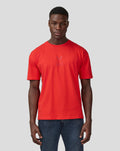 Male model in flame scarlet Oracle Red Bull Racing T-shirt with subtle centered chest logo.