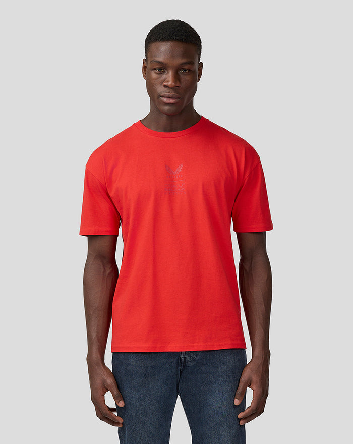 Male model in flame scarlet Oracle Red Bull Racing T-shirt with subtle centered chest logo.