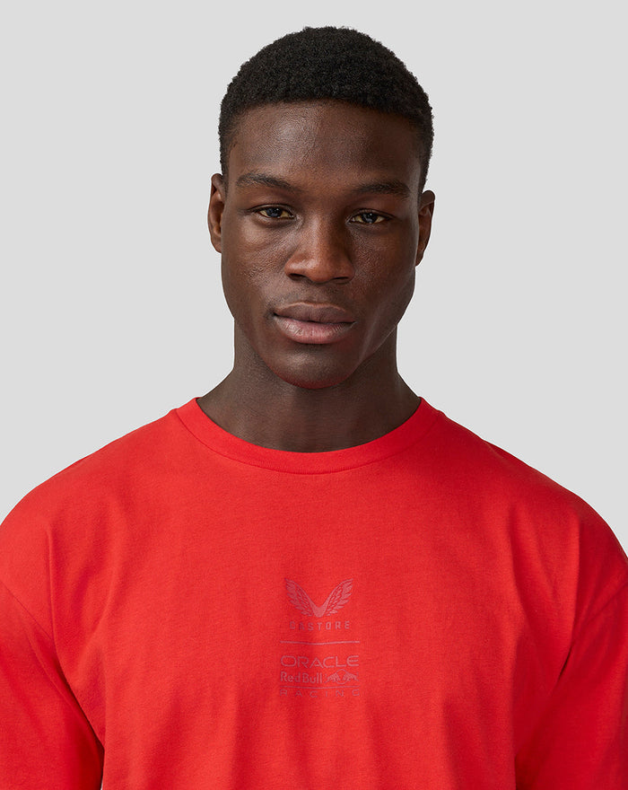 Close-up of male model wearing flame scarlet Oracle Red Bull Racing T-shirt showing the chest logo.