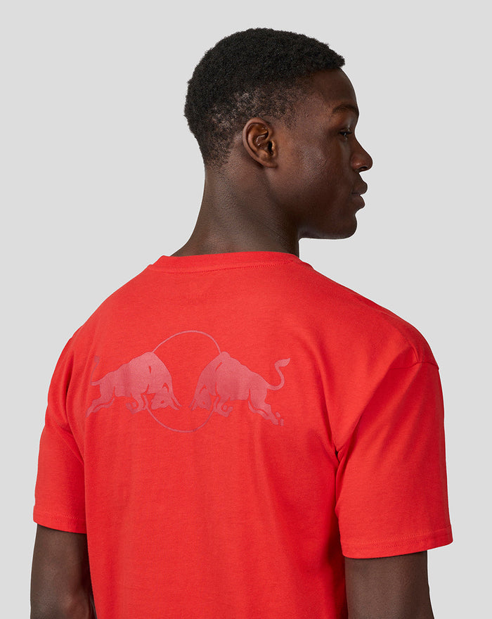 Back view of a model wearing a flame scarlet oversized Oracle Red Bull Racing T shirt with a large back logo