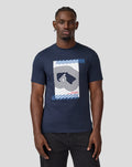 Front view of a model wearing the Black Iris T-Shirt with a bold white graphic framed by blue diagonal stripes on the chest