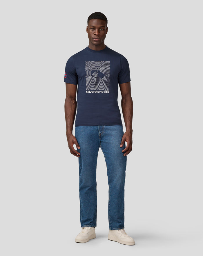 Front view of a man in a navy Silvertone Core T Shirt with a large white circular line graphic and Union Jack patch on the sleeve