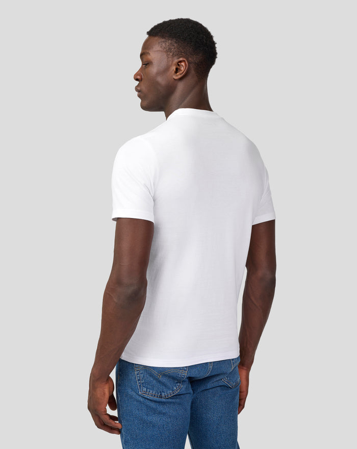 Back view of white Silverstone Core T-Shirt on a model with Union Jack flag patch on the sleeve