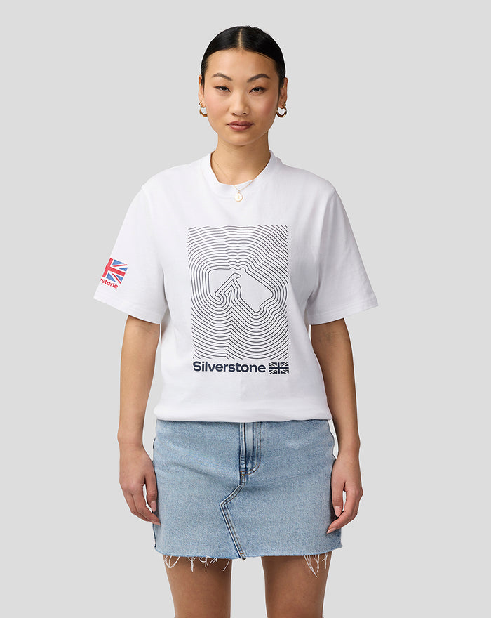 Woman model wearing white Silverstone Core T Shirt with front graphic and sleeve flag patch