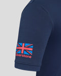 Close up of navy polo sleeve with Union Jack flag graphic and Silverstone branding