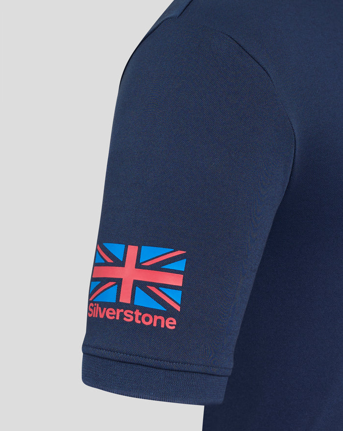 Close up of navy polo sleeve with Union Jack flag graphic and Silverstone branding