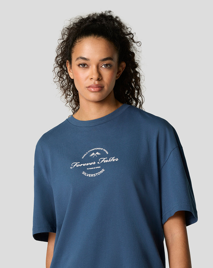 Front view of a model wearing a blue Sargasso Sea oversized T-shirt with a white circular chest graphic.