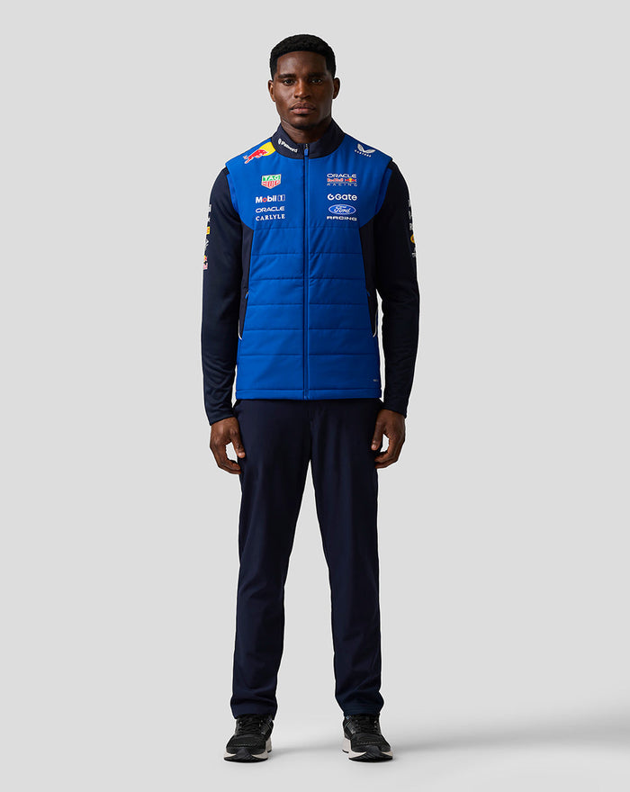 Front view of the Oracle Red Bull Racing Teamline Gilet in blue with multiple sponsor logos on the chest