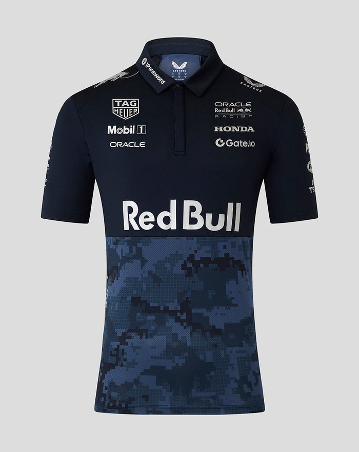 Front view of navy Pro Team Track Polo with sponsor logos on the chest and a pixel blue camouflage panel.