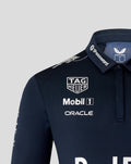 Shoulder and chest close-up of the Night Sky Pro Team Kit polo displaying Tag Heuer Mobil 1 and Oracle logos