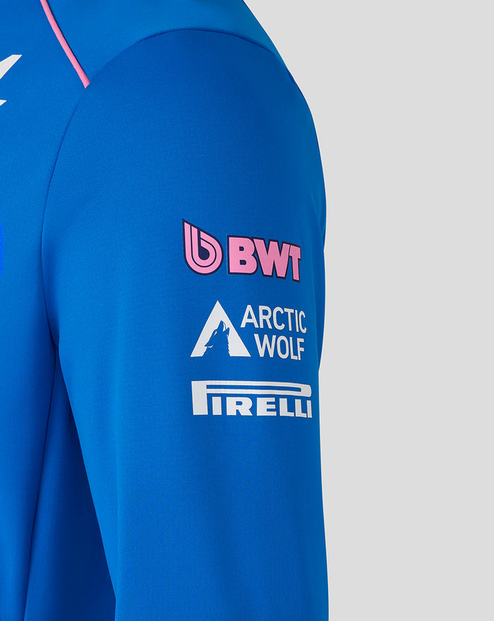Close up of the blue BWT Alpine jacket sleeve showing sponsor logos