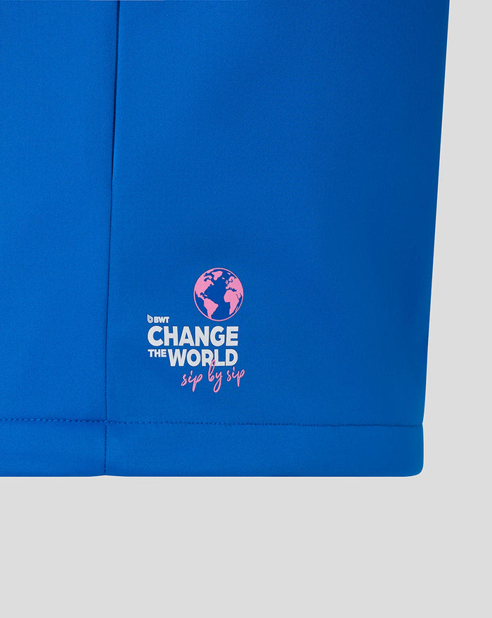 Blue BWT Alpine soft shell jacket with pink globe Change the World sip by sip graphic at the hem.