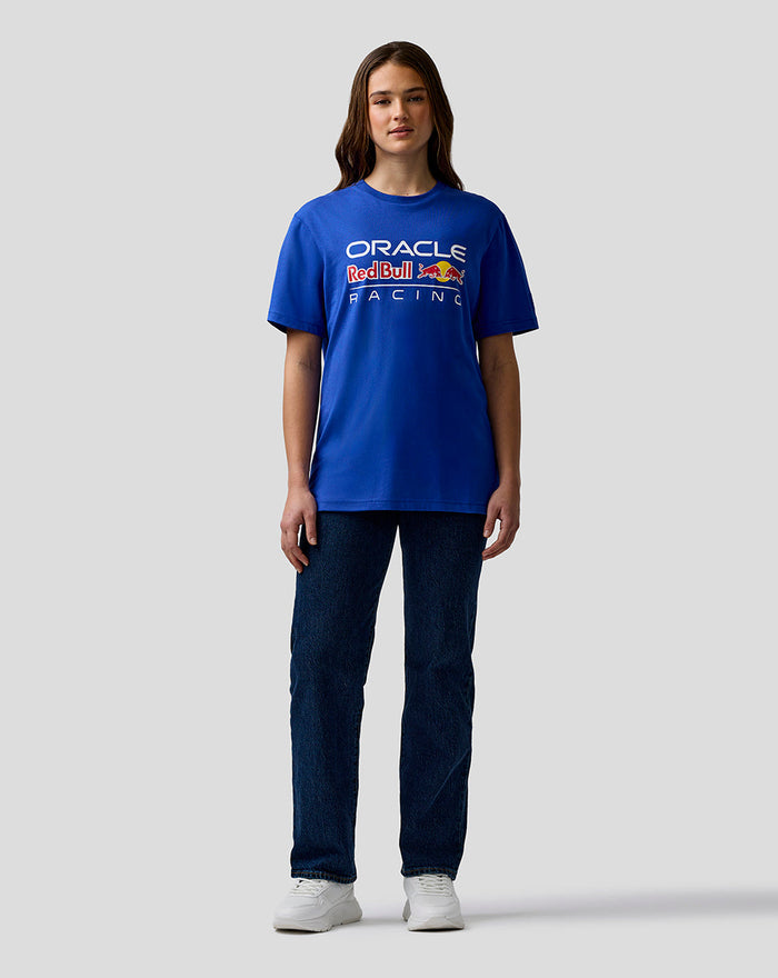 Full body shot of a model wearing a blue Oracle Red Bull Racing T shirt with chest logo and left sleeve badge