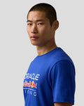 Profile view of a man wearing a blue Oracle Red Bull Racing T shirt