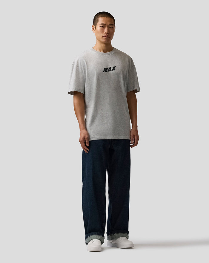 Back view of grey marl T shirt featuring a multi panel black and white collage graphic on the back