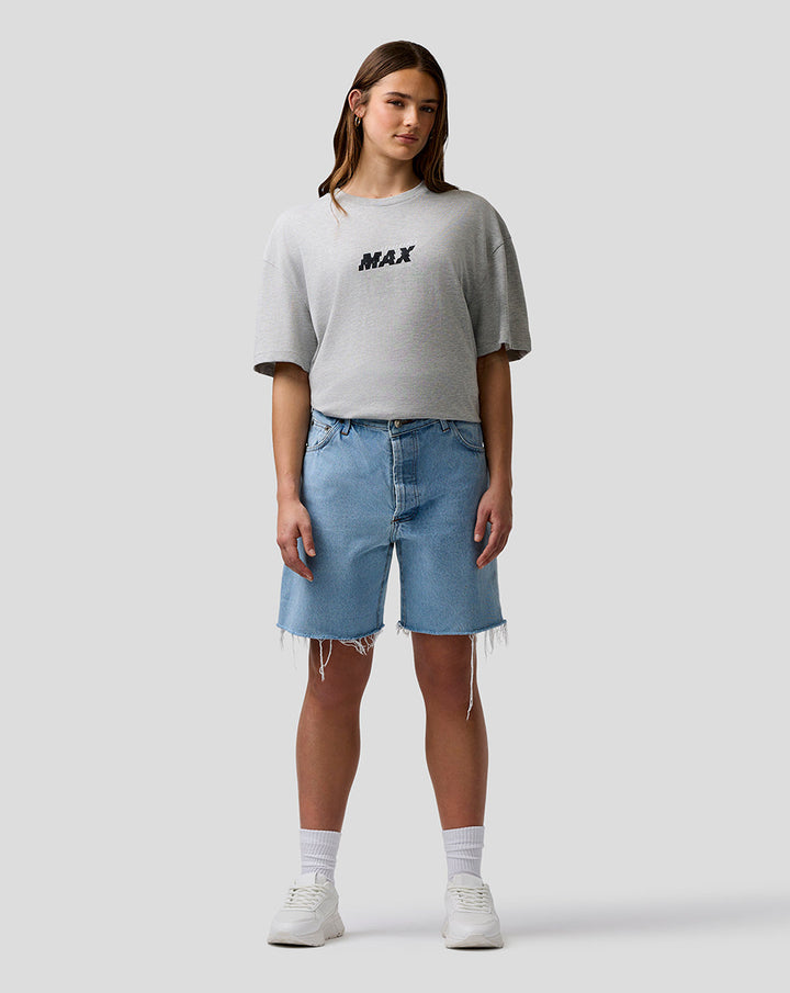 Female model wearing grey marl Max Verstappen T Shirt with a centered MAX logo on the chest.
